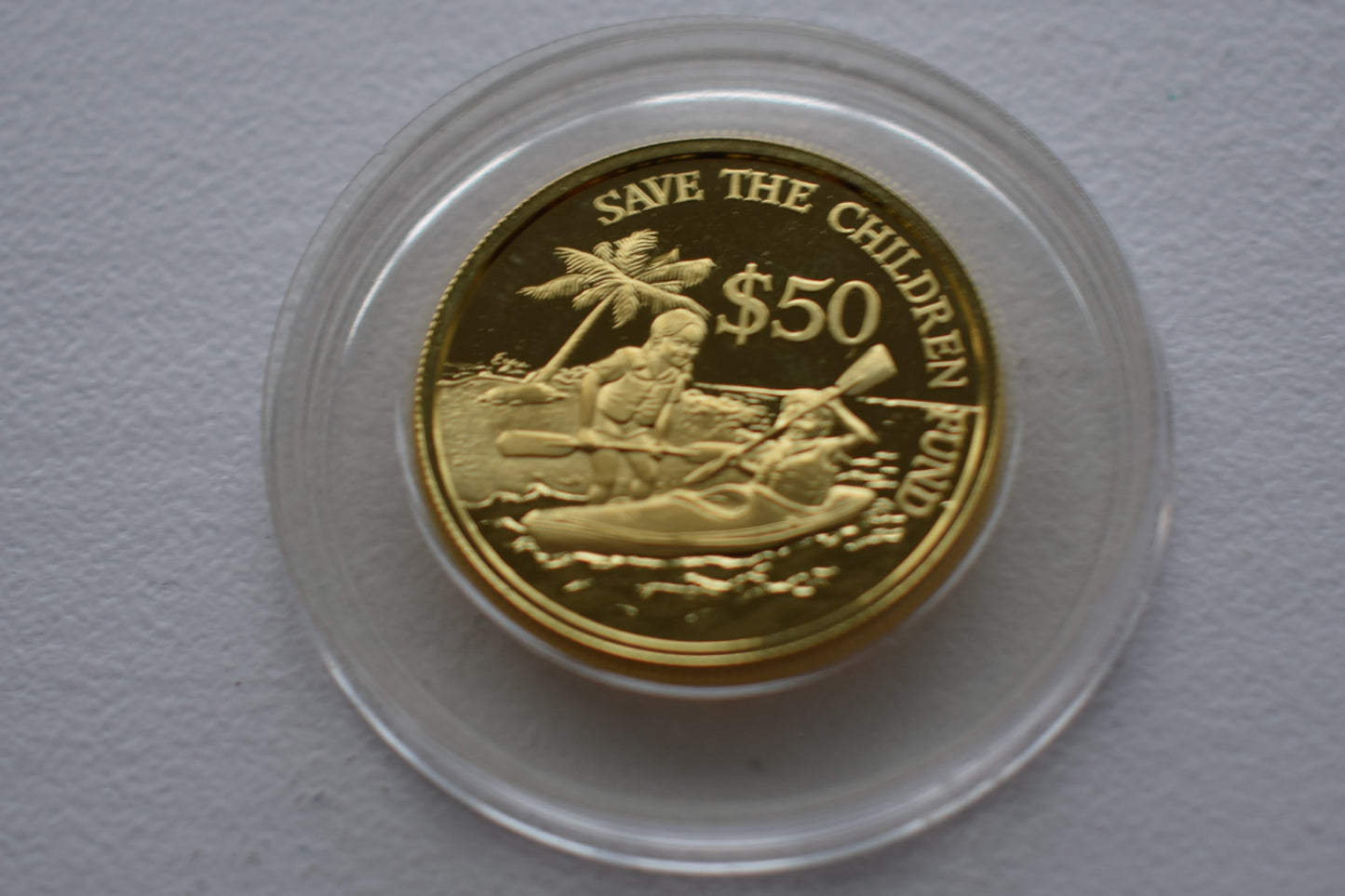 1989 Singapore Save the Children Fund 10 g Gold Proof Coin
