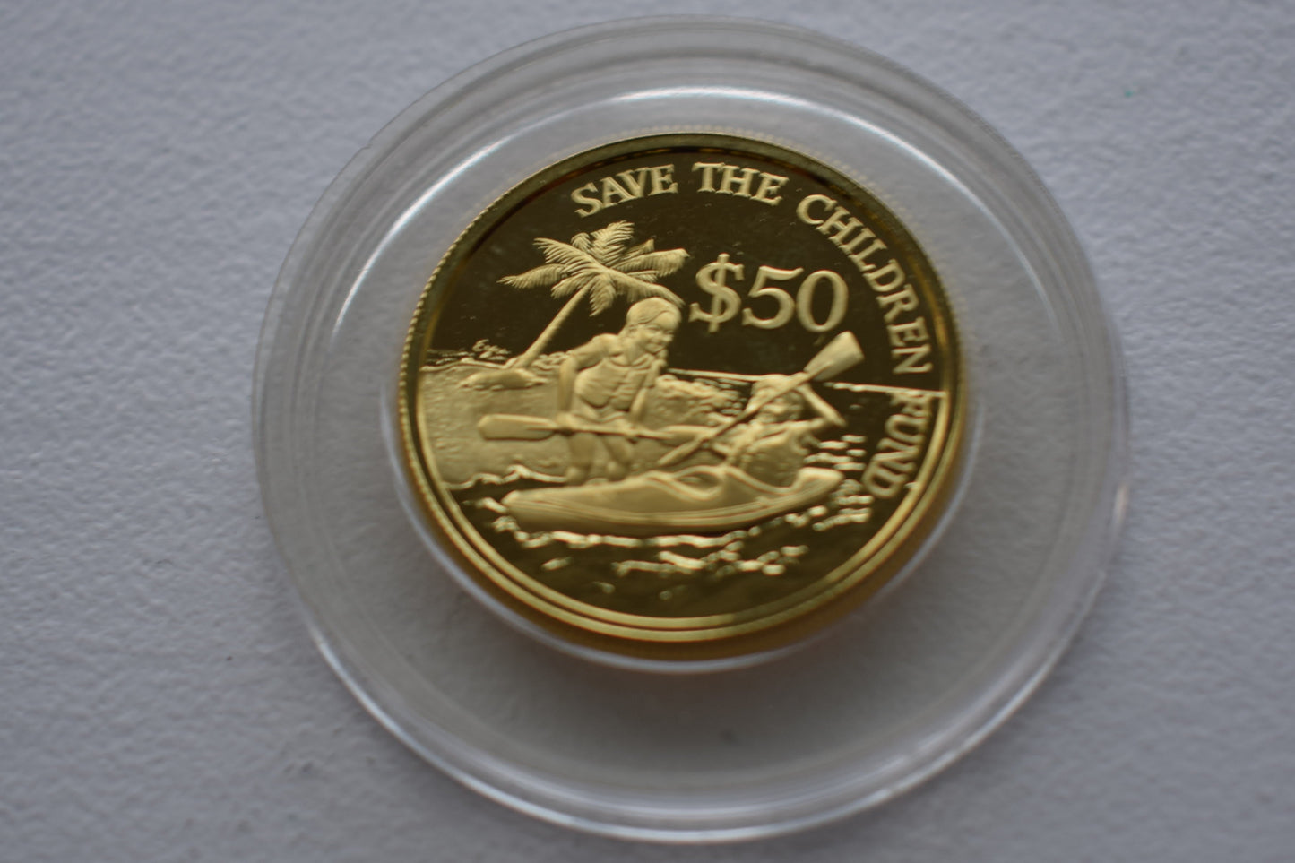 1989 Singapore Save the Children Fund 10 g Proof Gold Coin